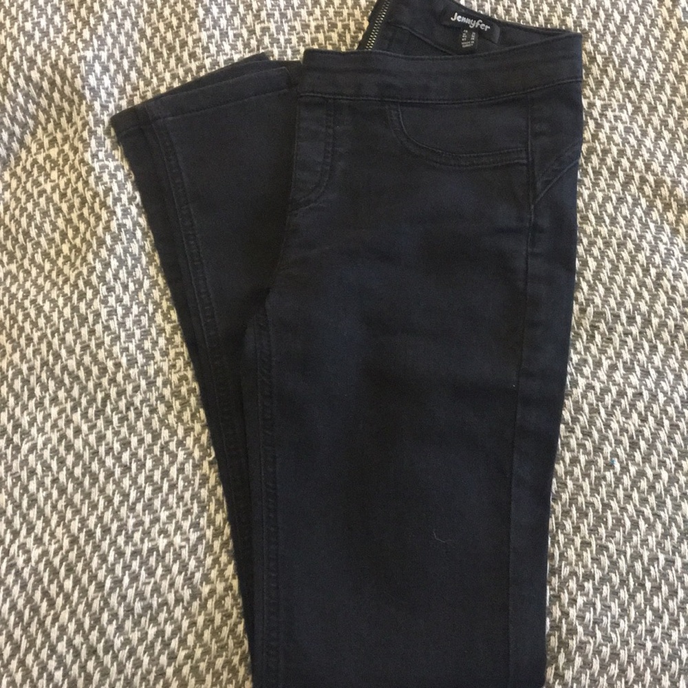 Black skinny jeans with zipper on the back